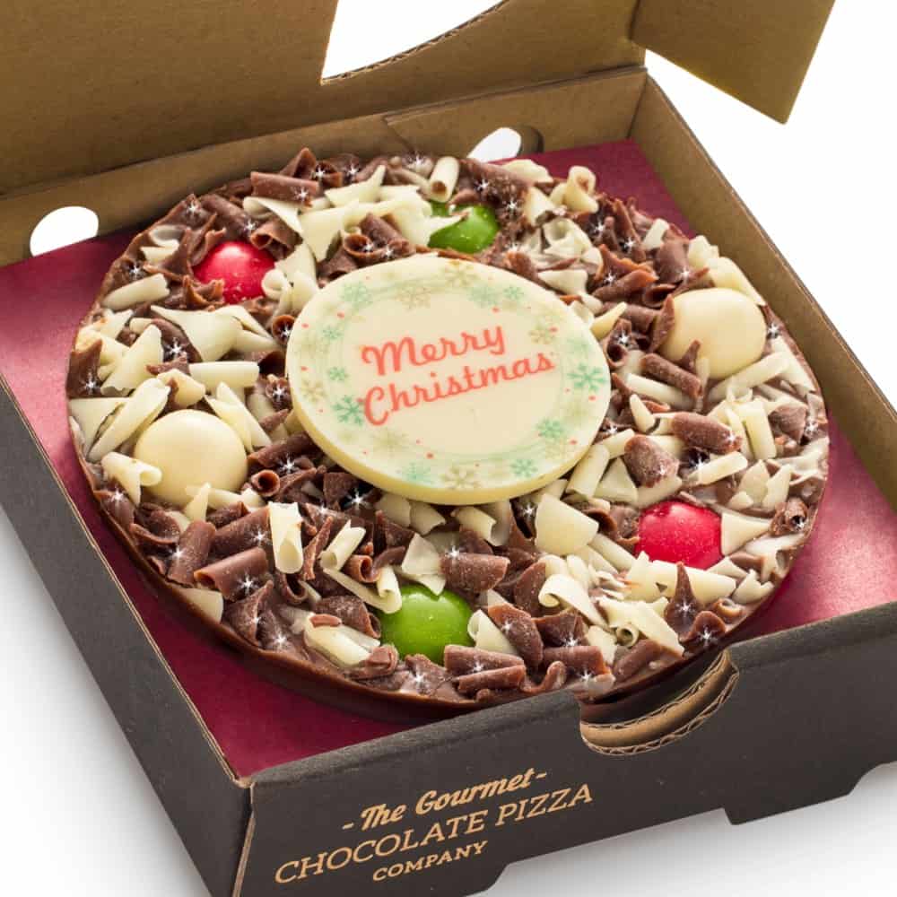 Close up of 4" Mini Christmas Chocolate Pizza with Merry Christmas Plaque
